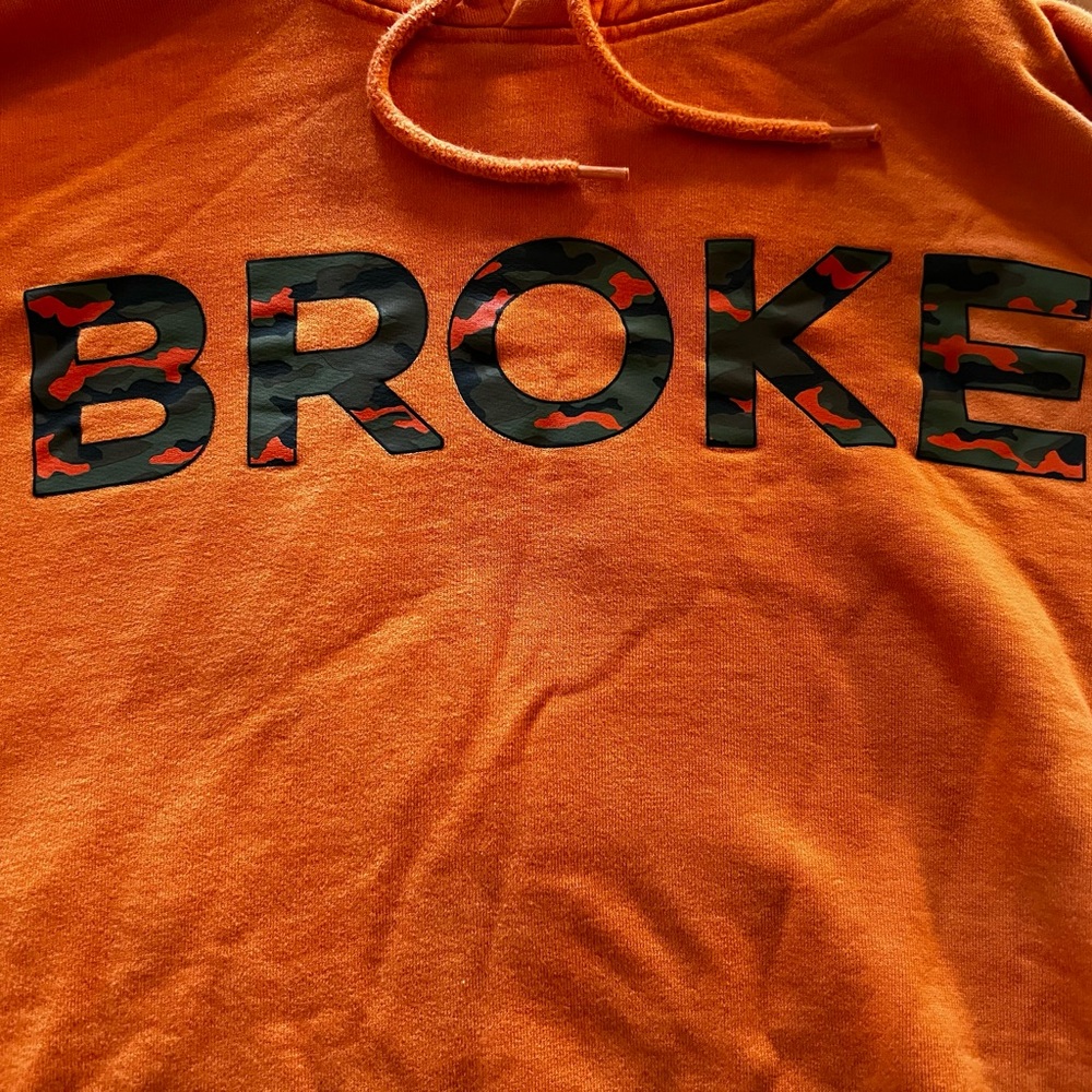 XL H&M Orange camo letter “a BROKE” Hoodie